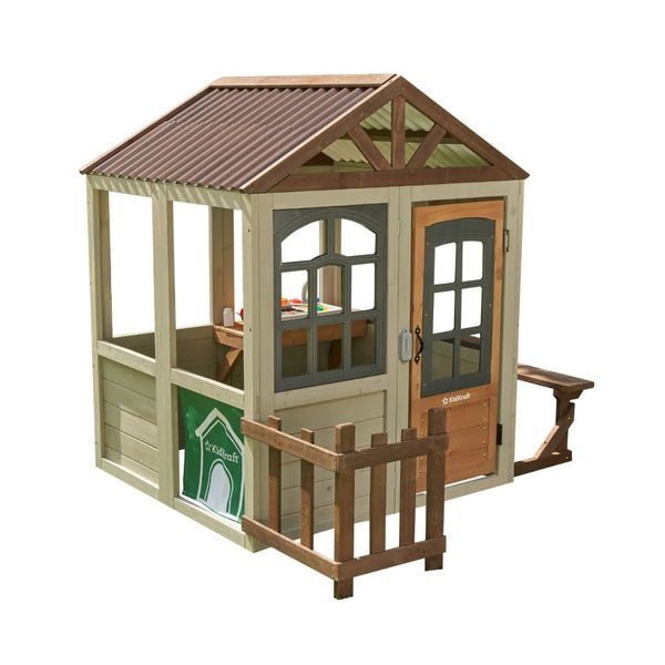 KidKraft Pioneer Cottage Wooden Outdoor Playhouse with Kitchen, Doorbell & Picket Fence – Pretend Playhouse for Kids